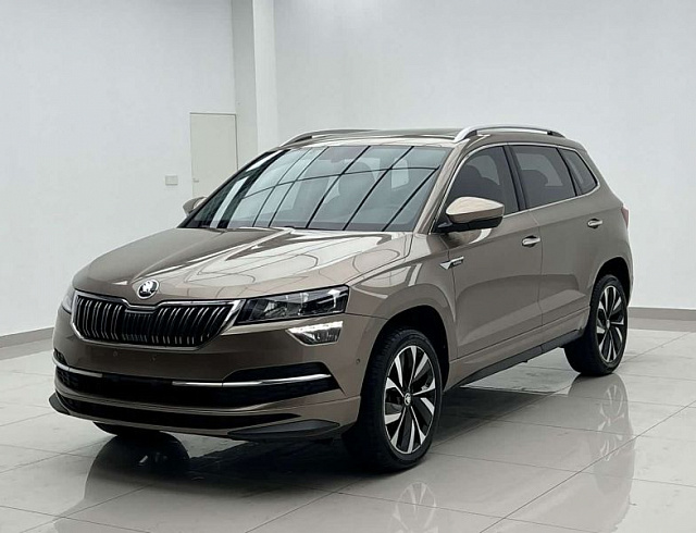 Skoda Karoq 1.4 л 2023 г. шампань/коричневый, пробег 20000 км