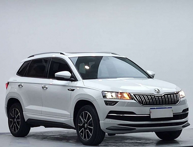 Skoda Karoq 1.4 л 2023 г. Белый, пробег 11000 км
