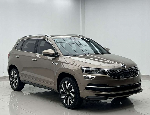 Skoda Karoq 1.4 л 2023 г. шампань/коричневый, пробег 20000 км