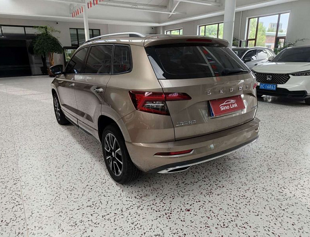 Skoda Karoq 1.4 л 2023 г. шампань/коричневый, пробег 18000 км