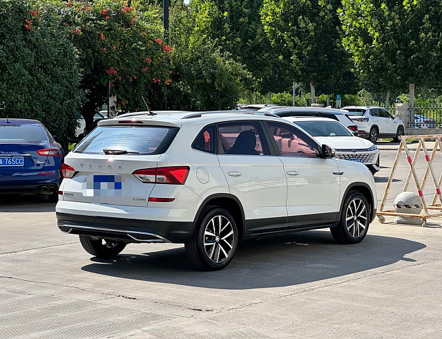 Skoda Kamiq 1.5 л 2023 г. Белый, пробег 21000 км