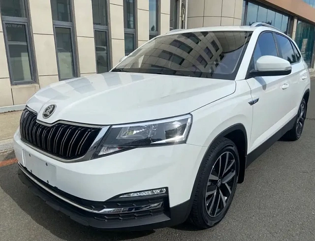 Skoda Kamiq 1.5 л 2023 г. Белый, пробег 18000 км