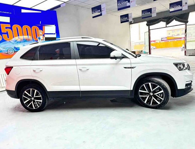 Skoda Kamiq 1.5 л 2023 г. Белый, пробег 13000 км