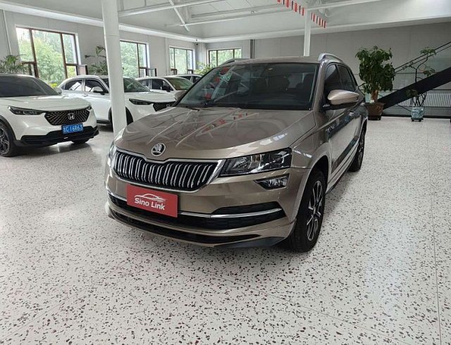 Skoda Karoq 1.4 л 2023 г. шампань/коричневый, пробег 18000 км