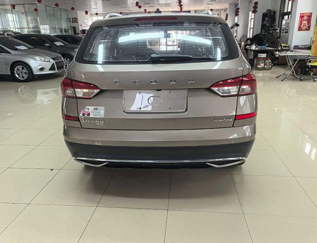 Skoda Kamiq 1.5 л 2022 г. желто-оранжевый, пробег 23000 км