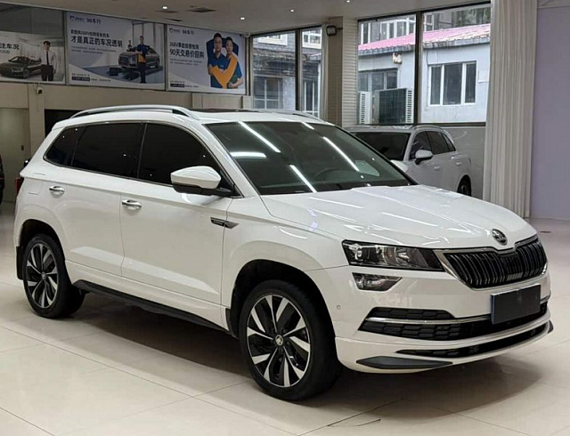 Skoda Karoq 1.4 л 2023 г. Белый, пробег 26000 км