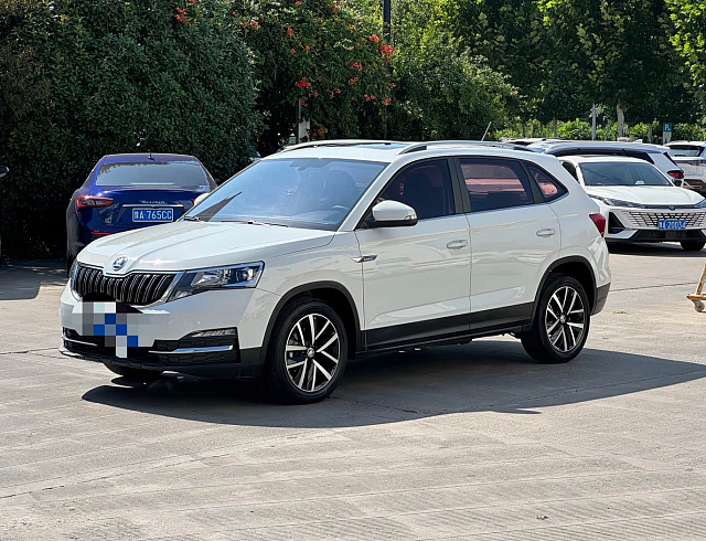 Skoda Kamiq 1.5 л 2023 г. Белый, пробег 21000 км