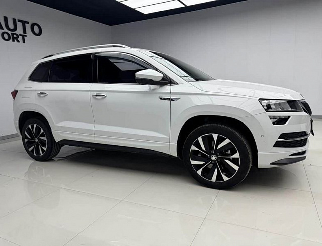 Skoda Karoq 1.4 л 2023 г. Белый, пробег 12000 км