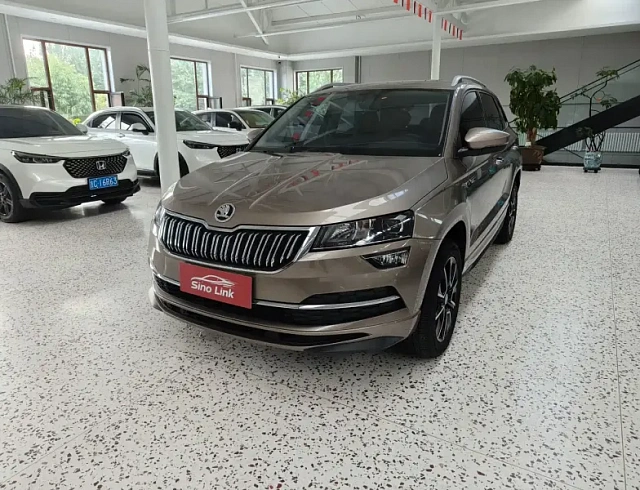 Skoda Karoq 1.4 л 2023 г. шампань/коричневый, пробег 18000 км